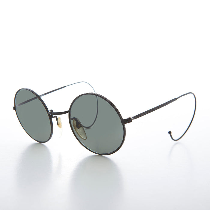image of sunglasses model SUNGLASS MUSEUM Round Vintage Sunglass with Cable Temples - Barton