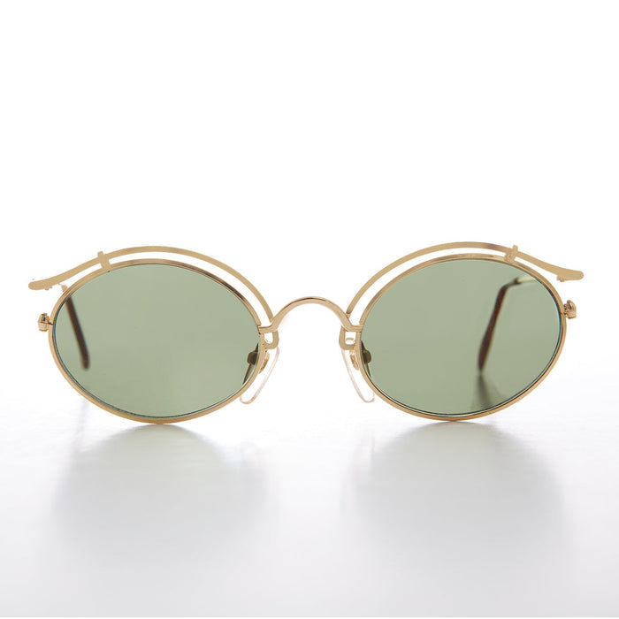 image of sunglasses model SUNGLASS MUSEUM SUNGLASS MUSEUM Gold Oval Tortoise Eyelid Vintage Sunglass - Cohen