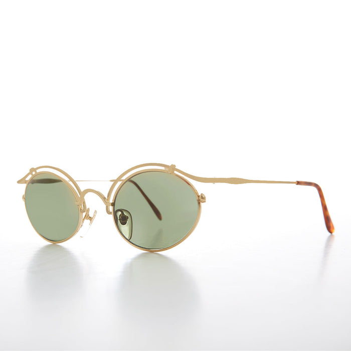 image of sunglasses model SUNGLASS MUSEUM SUNGLASS MUSEUM Gold Oval Tortoise Eyelid Vintage Sunglass - Cohen