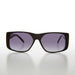 image of sunglasses model SUNGLASS MUSEUM Square Block Sunglass with Gold Rim Accents  - Efren