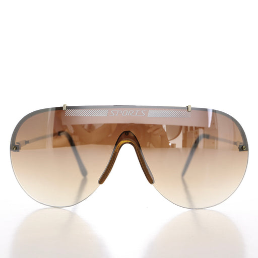 image of sunglasses model SUNGLASS MUSEUM SUNGLASS MUSEUM Rimless 80s Aviator Sunglasses - Exit