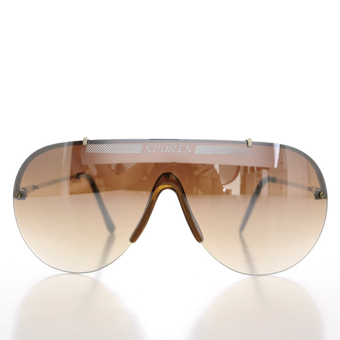 image of sunglasses model SUNGLASS MUSEUM SUNGLASS MUSEUM Rimless 80s Aviator Sunglasses - Exit