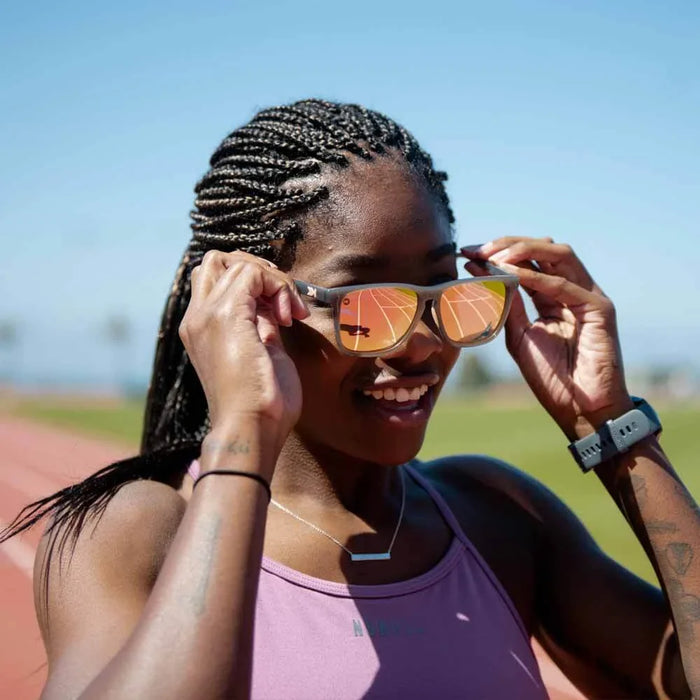 image of sunglasses model Knockaround Jelly Grey / Peach Fast Lanes Sport