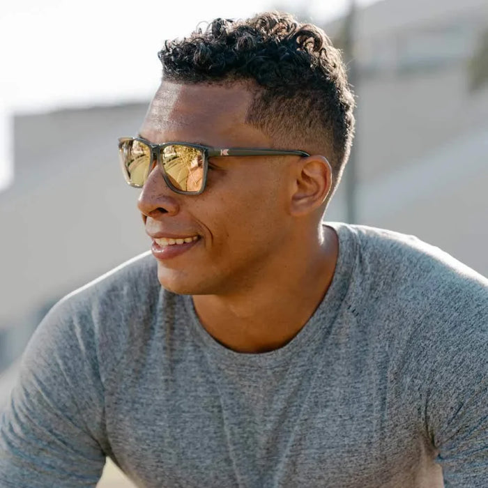 image of sunglasses model Knockaround Jelly Grey / Peach Fast Lanes Sport