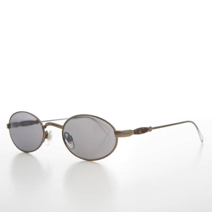 image of sunglasses model SUNGLASS MUSEUM SUNGLASS MUSEUM Oval 90s Vintage Sunglass with Intricate Temple - Kit