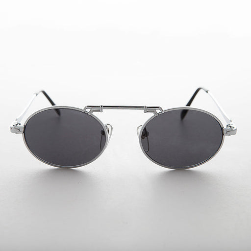 image of sunglasses model SUNGLASS MUSEUM Oval Vintage Aviator Sunglass with Brow Bar - London
