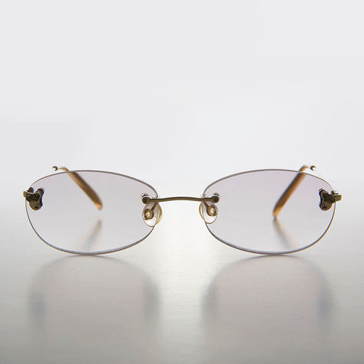 image of sunglasses model SUNGLASS MUSEUM Oval Reading Glasses with Color Tinted Rimless Lens  - Lonnie