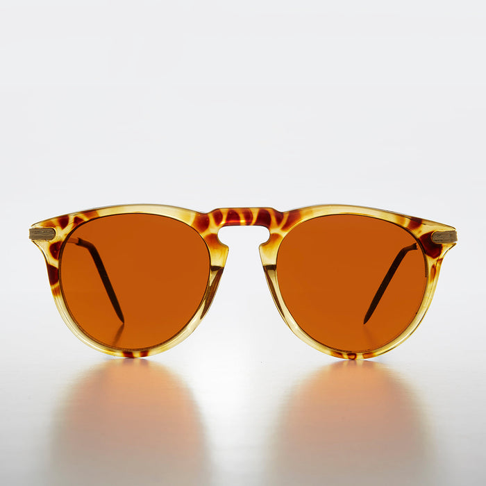 image of sunglasses model SUNGLASS MUSEUM SUNGLASS MUSEUM Round Amber Tinted Vintage Sunglass - West