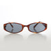 image of sunglasses model SUNGLASS MUSEUM Oval 90s Acetate Vintage Sunglass - Zizzo