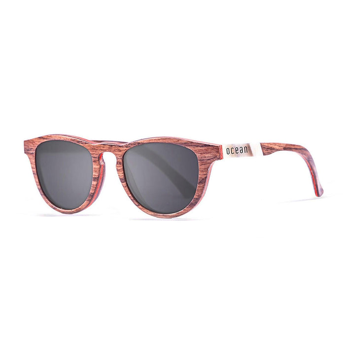 ocean sunglasses KRNglasses model AZORES SKU 54003.4 with walnut & turquoise line frame and smoke lens