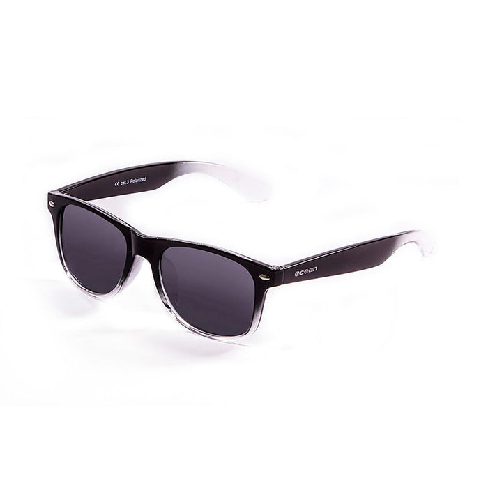 ocean sunglasses KRNglasses model BEACH SKU 18202.113 with transparent black frosted frame and revo green lens