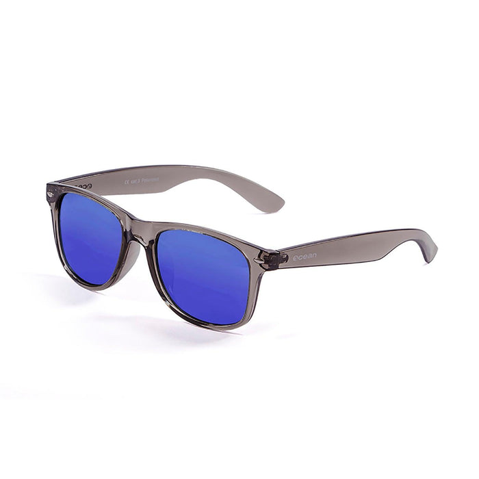 ocean sunglasses KRNglasses model BEACH SKU 18202.112 with transparent black frosted frame and revo blue lens