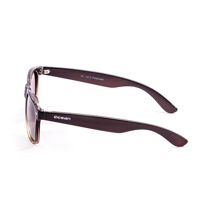 ocean sunglasses KRNglasses model BEACH SKU 18202.39 with transparent black frame and revo violet lens