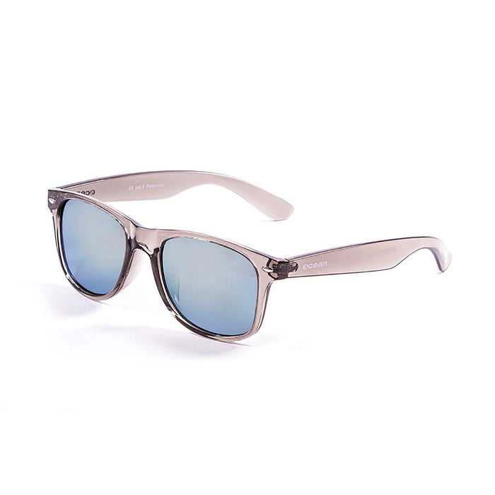 ocean sunglasses KRNglasses model BEACH SKU 18202.12 with transparent blue frame and revo blue lens