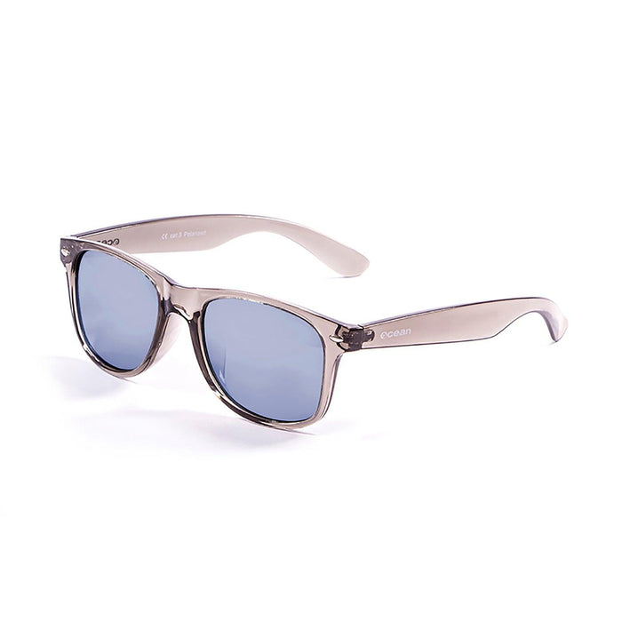 ocean sunglasses KRNglasses model BEACH SKU 18202.7 with transparent black frame and revo blue iridium lens