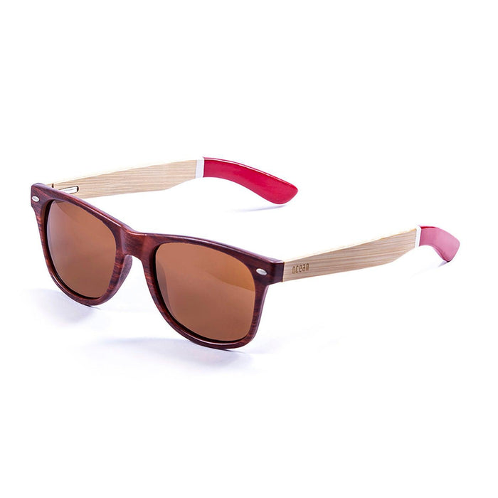 ocean sunglasses KRNglasses model BEACH SKU 50111.2 with bamboo dark & blue frame and revo blue lens