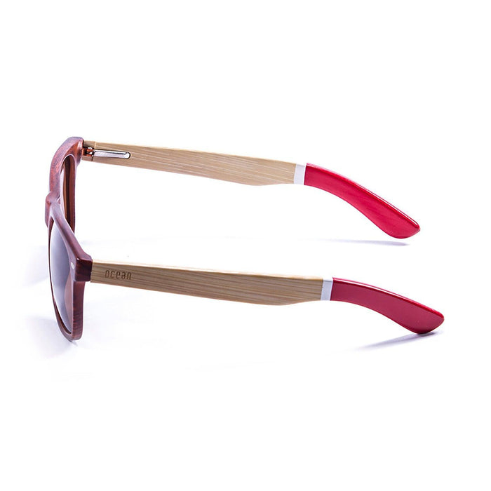 ocean sunglasses KRNglasses model BEACH SKU 50011.2 with bamboo dark frame and revo blue lens