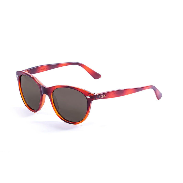 ocean sunglasses KRNglasses model LANDAS SKU 58000.1 with purple transparent frame and smoke lens