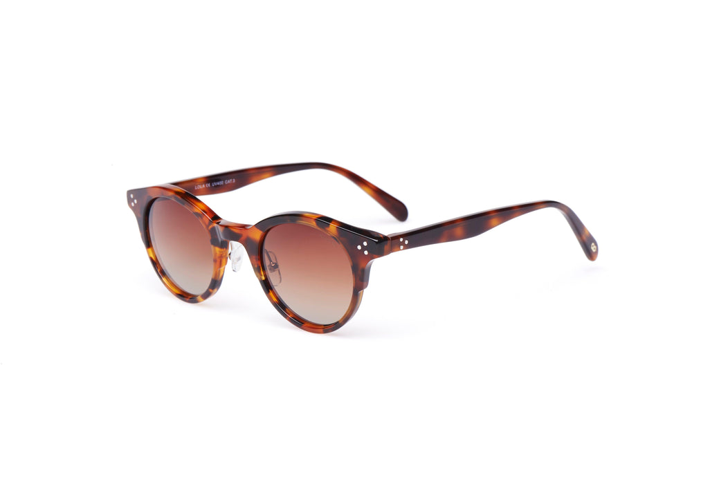 KYPERS sunglasses model LOLA LO004 with dark havana frame and gradient brown lens
